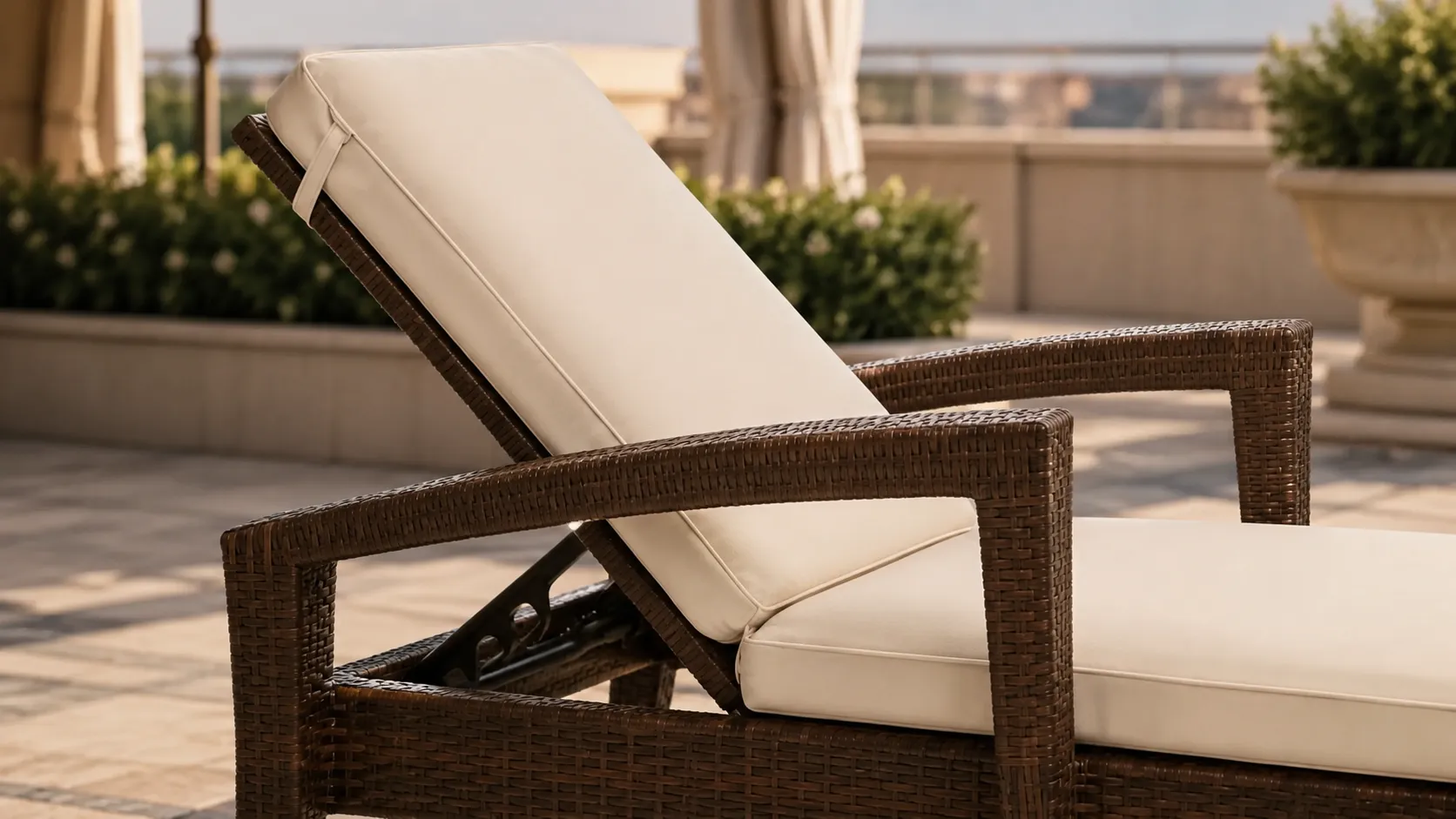 Adjustable backrest and cushion detail of wicker outdoor sun lounger