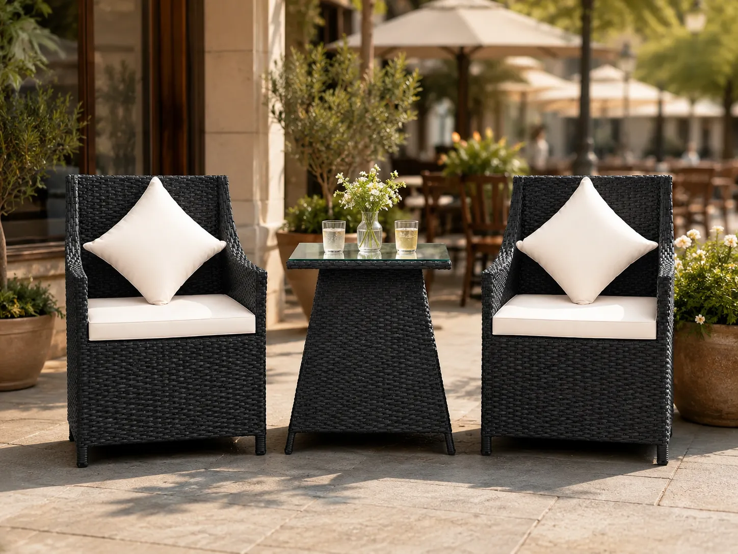 Black rattan bistro table and chairs for café terrace