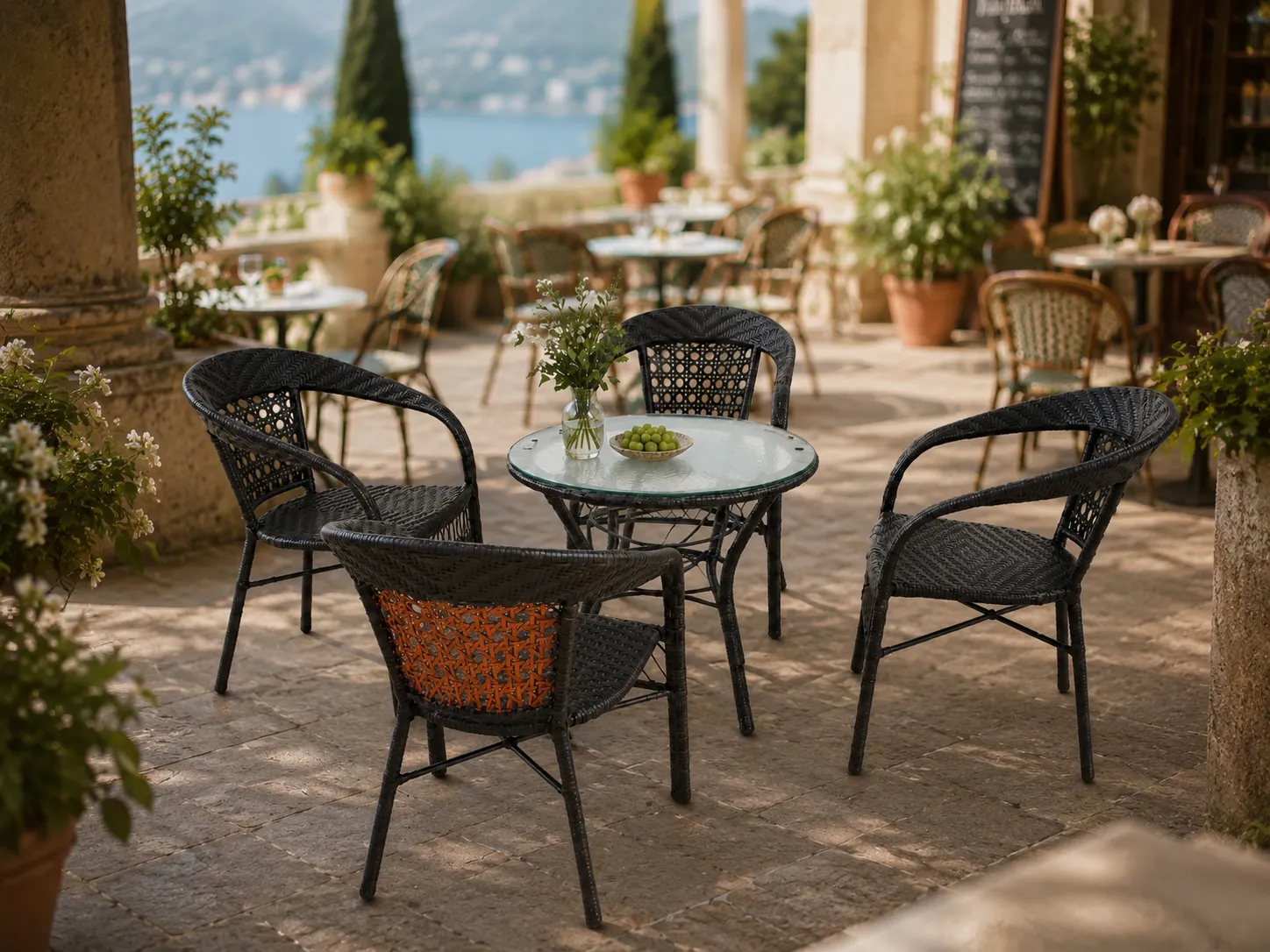 Dark brown rattan dining table and chairs for café terrace
