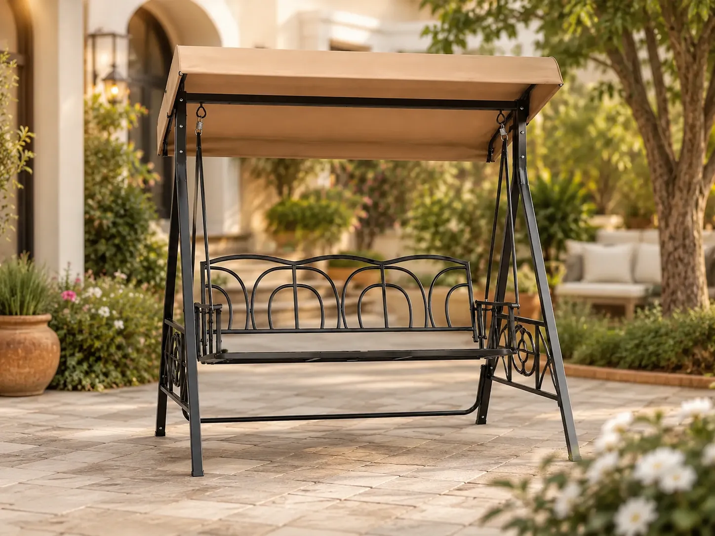 Outdoor patio swing chair used in a courtyard leisure space