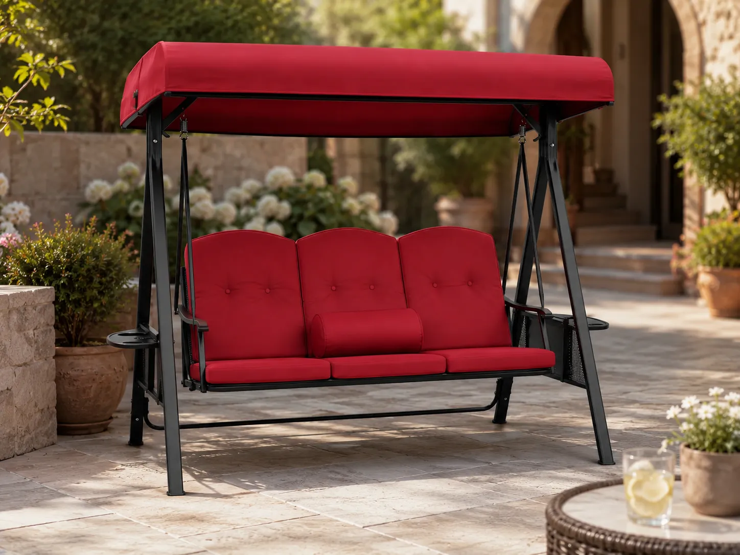 Steel outdoor swing sofa used in a courtyard leisure space