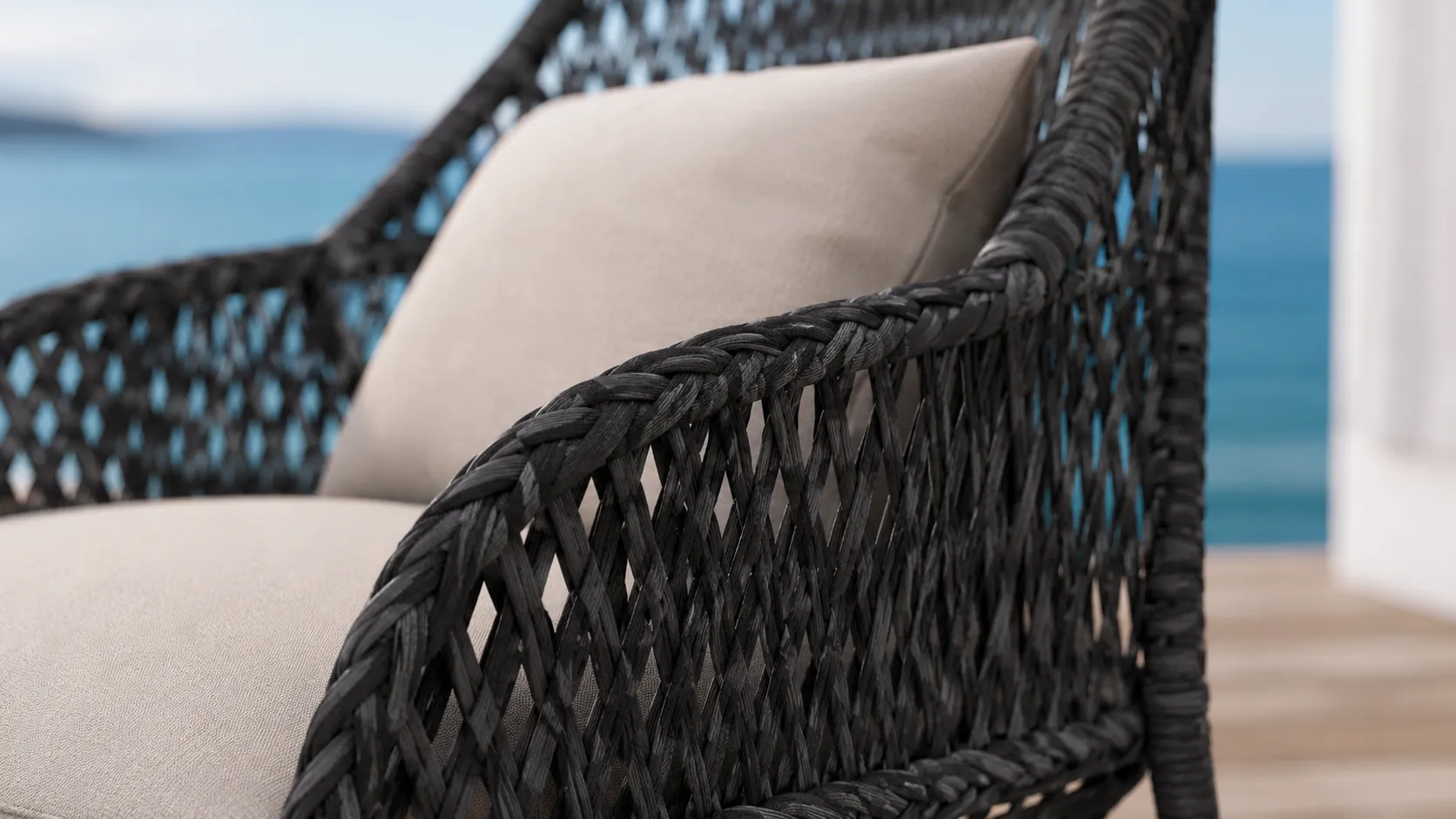 Black Wicker Lounge Chair and Ottoman for Outdoor Hospitality Projects