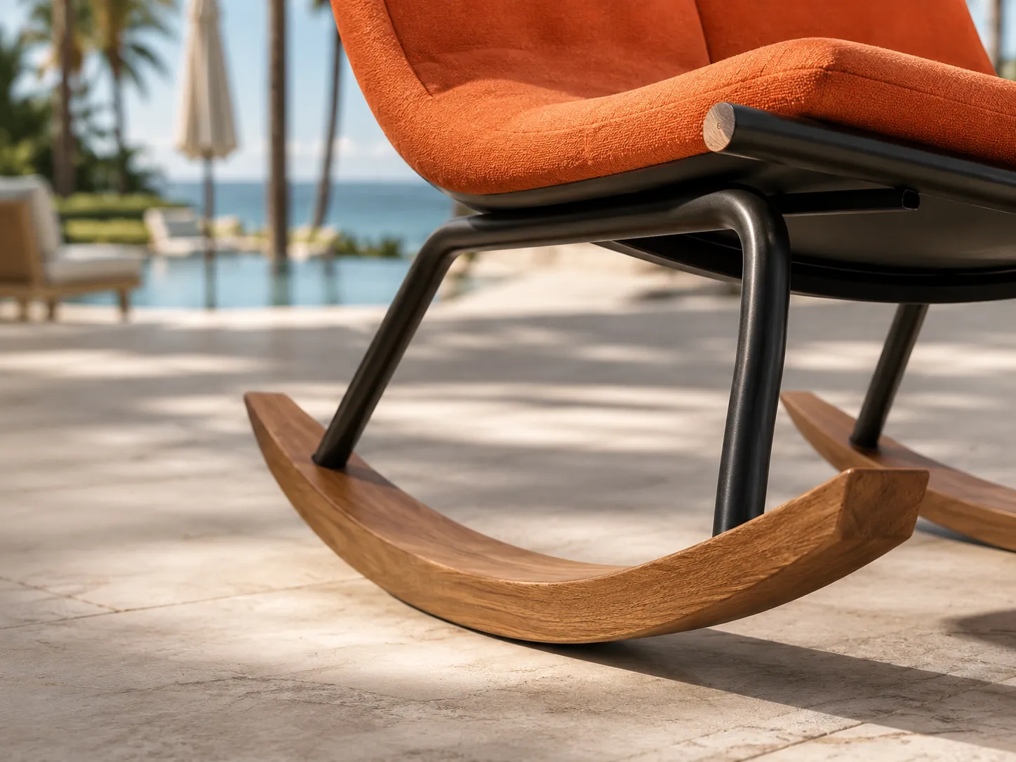 Curved teak rocking base detail of outdoor lounge chair