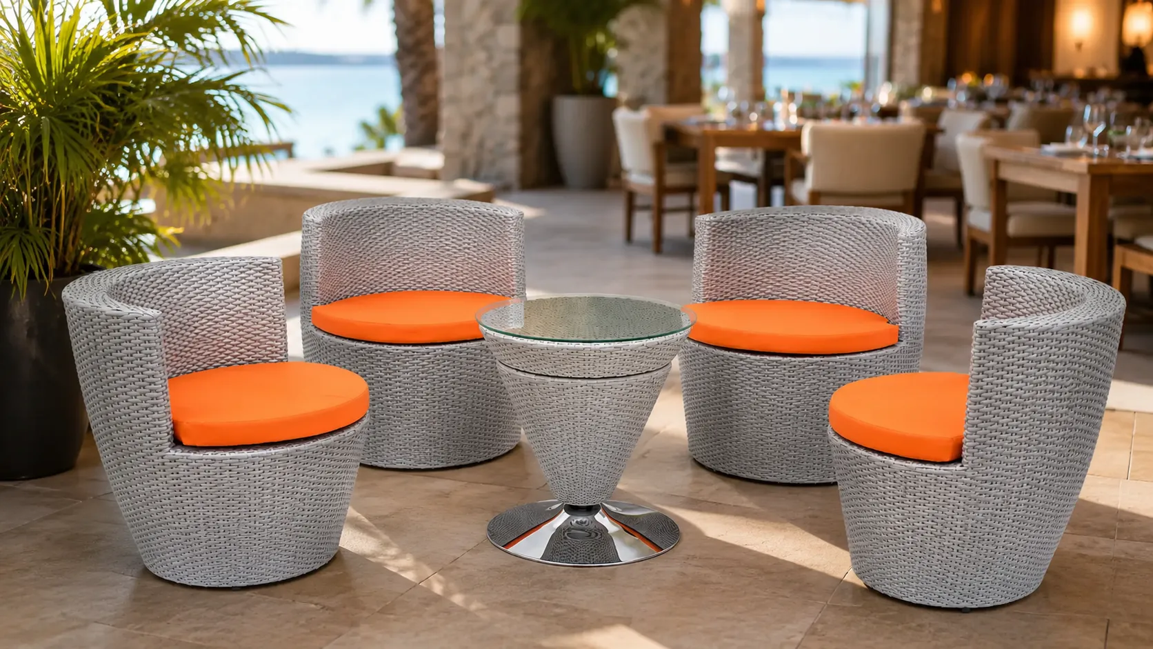 Four chair rattan conversation set layout with round glass table