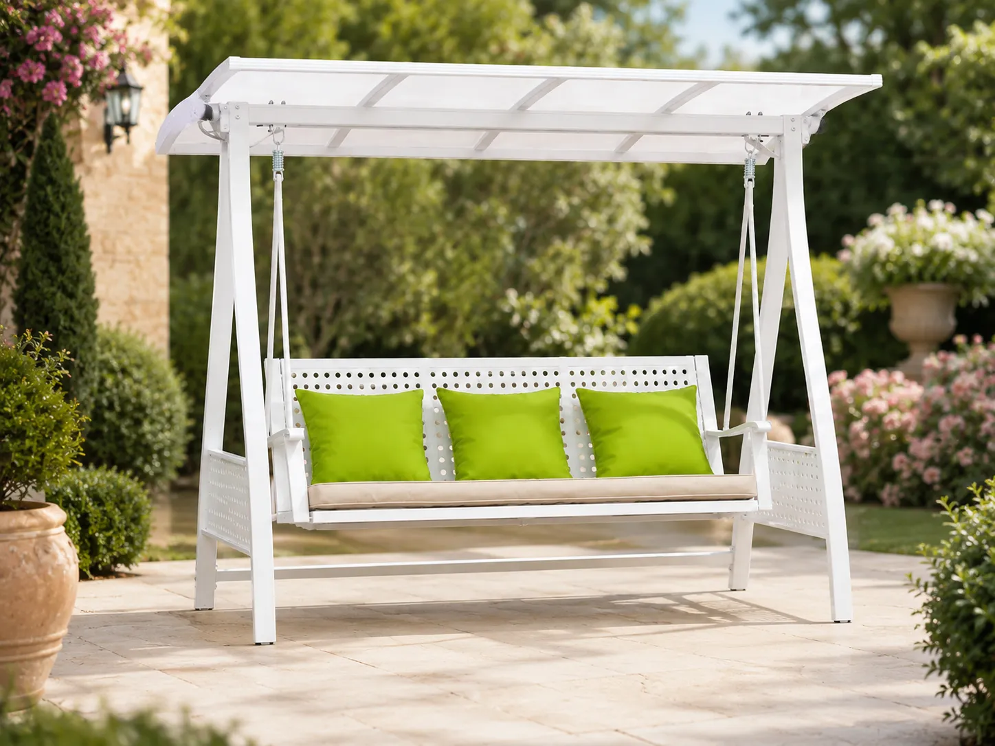 White outdoor canopy swing sofa used in a garden leisure area