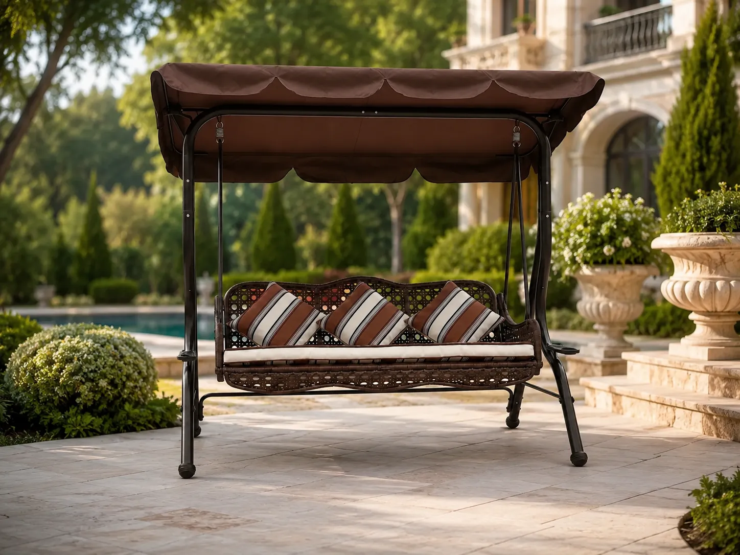 Wicker outdoor canopy swing sofa used in a garden leisure area