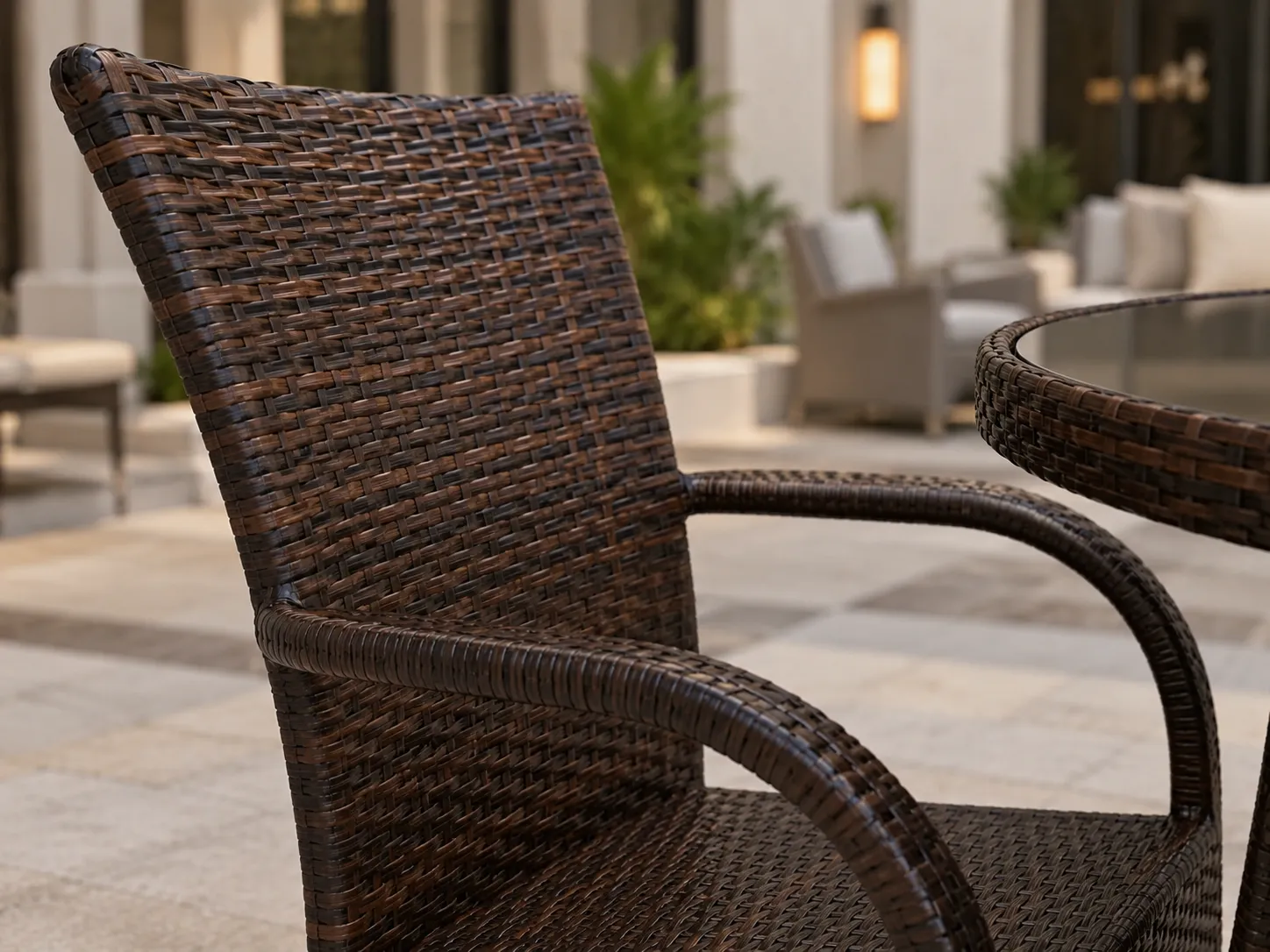 High-back rattan dining chair detail