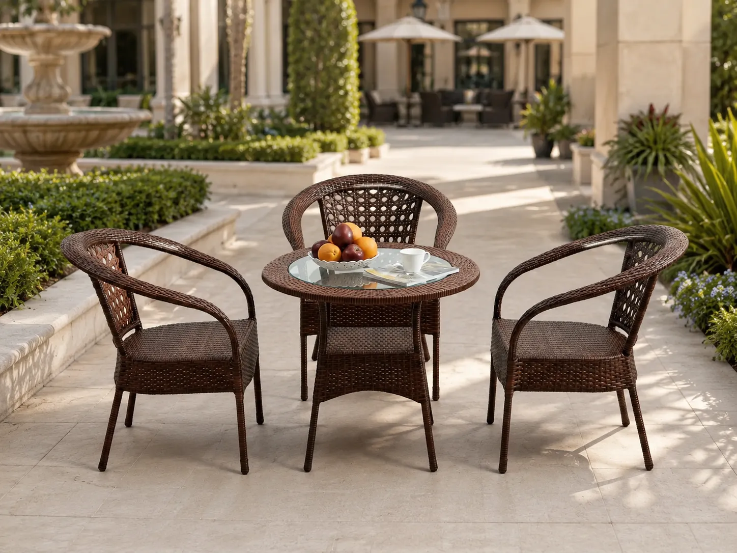 Brown wicker bistro set for hotel courtyard