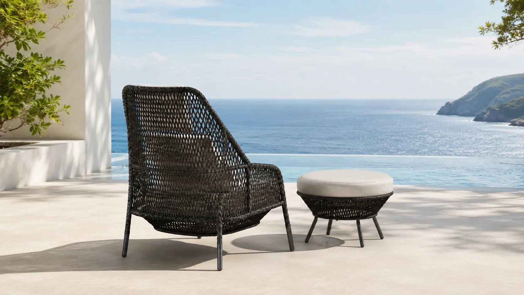 Black Wicker Lounge Chair and Ottoman for Outdoor Hospitality Projects