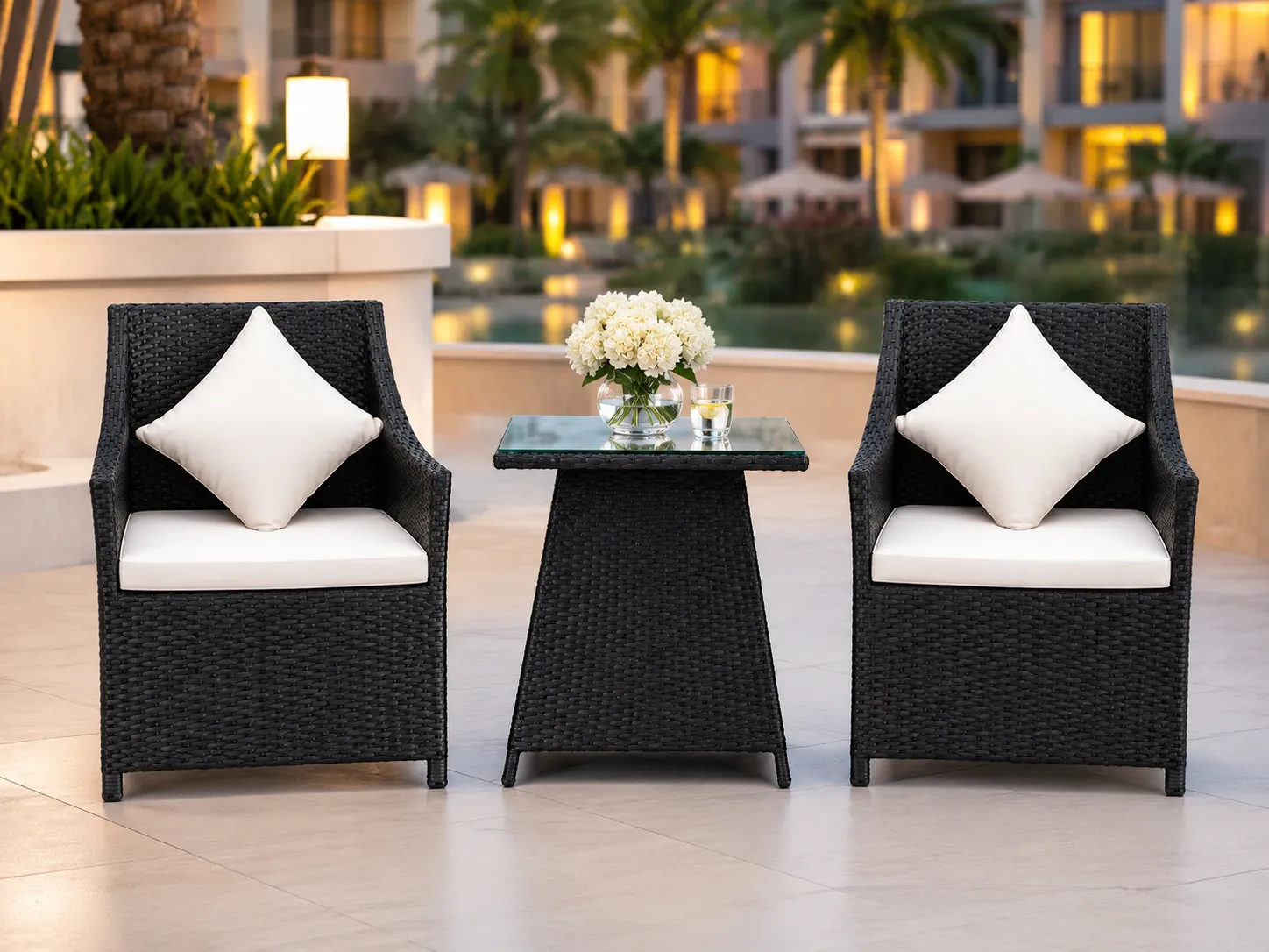 Black wicker bistro set for hotel terrace