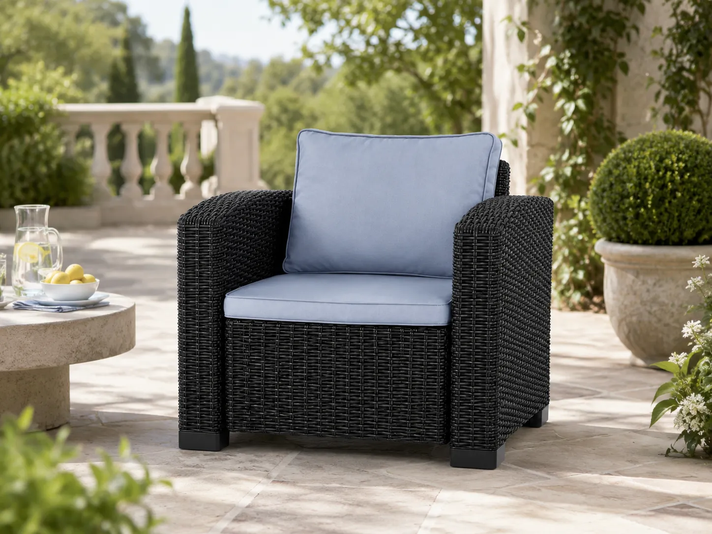 PE rattan outdoor armchair used in a patio seating area