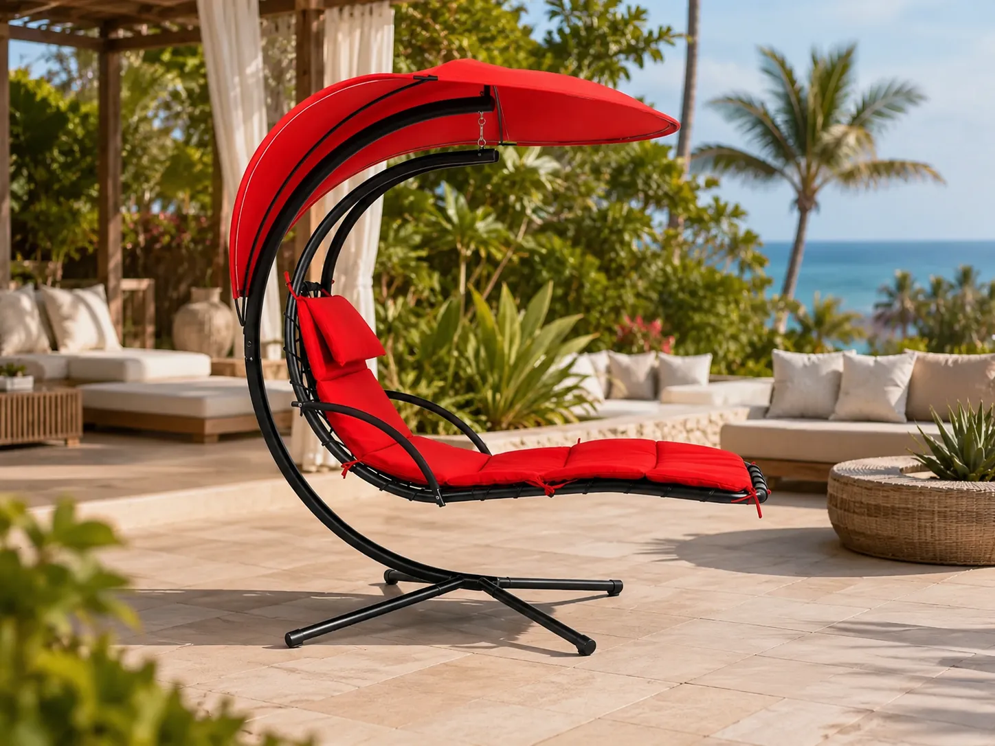 Stainless steel hanging lounge chair used in an outdoor patio seating area