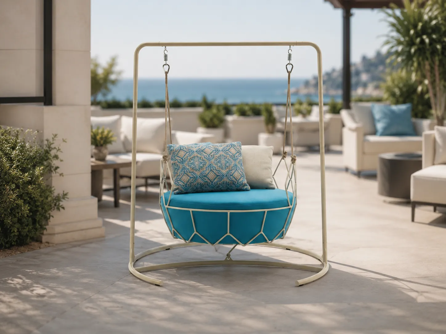 Stainless steel hanging swing chair used in an outdoor patio leisure area