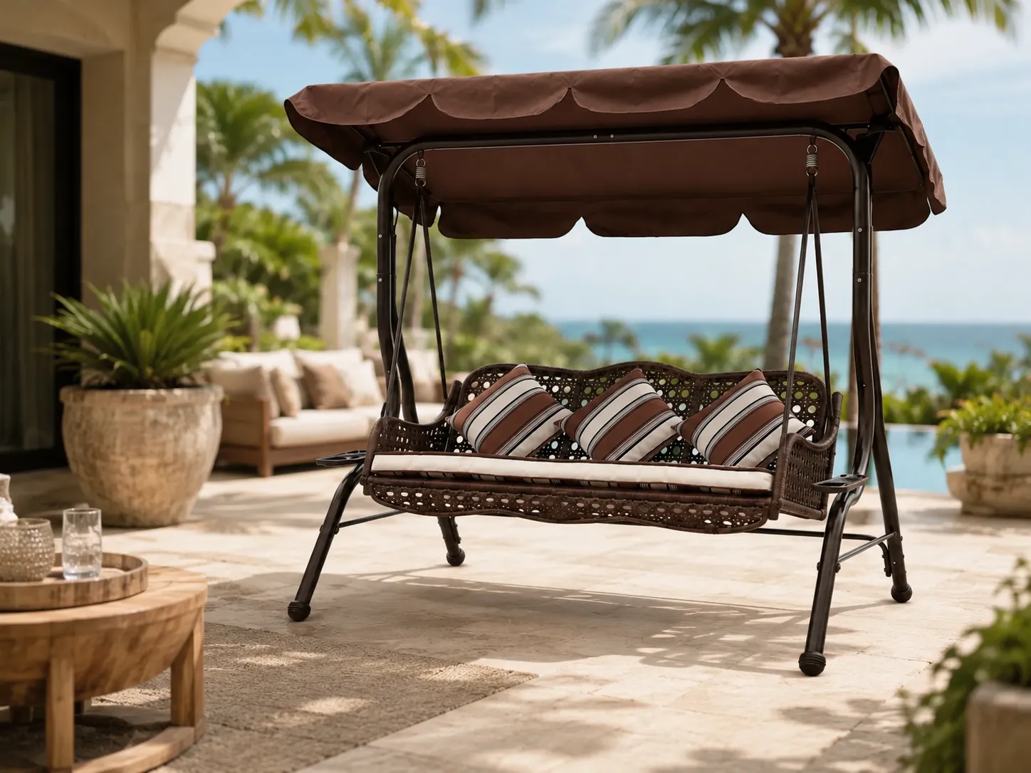 Wicker canopy swing sofa used in an outdoor patio seating area