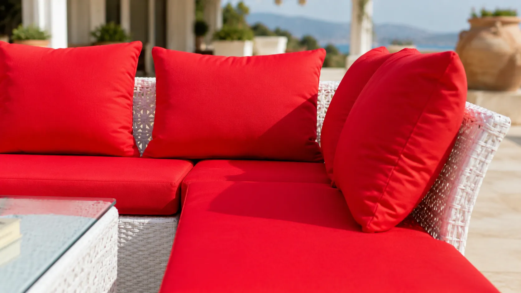 Red cushion detail of PE rattan outdoor sectional sofa set