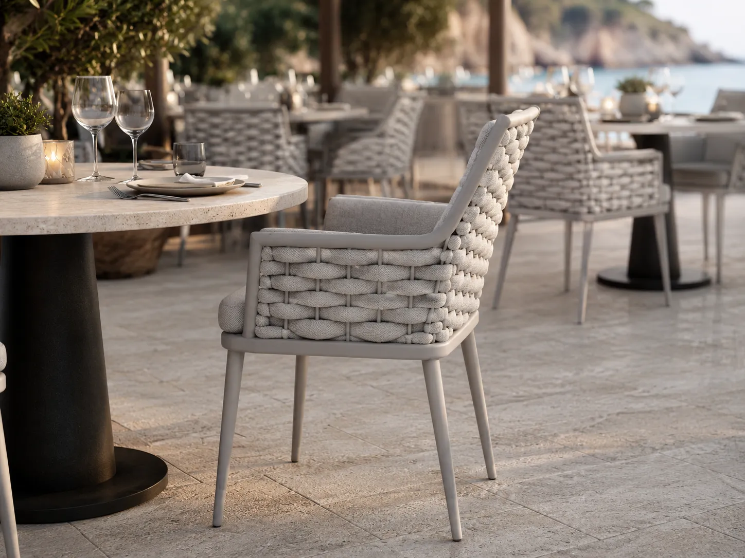 Grey rope dining chair used in a restaurant dining space