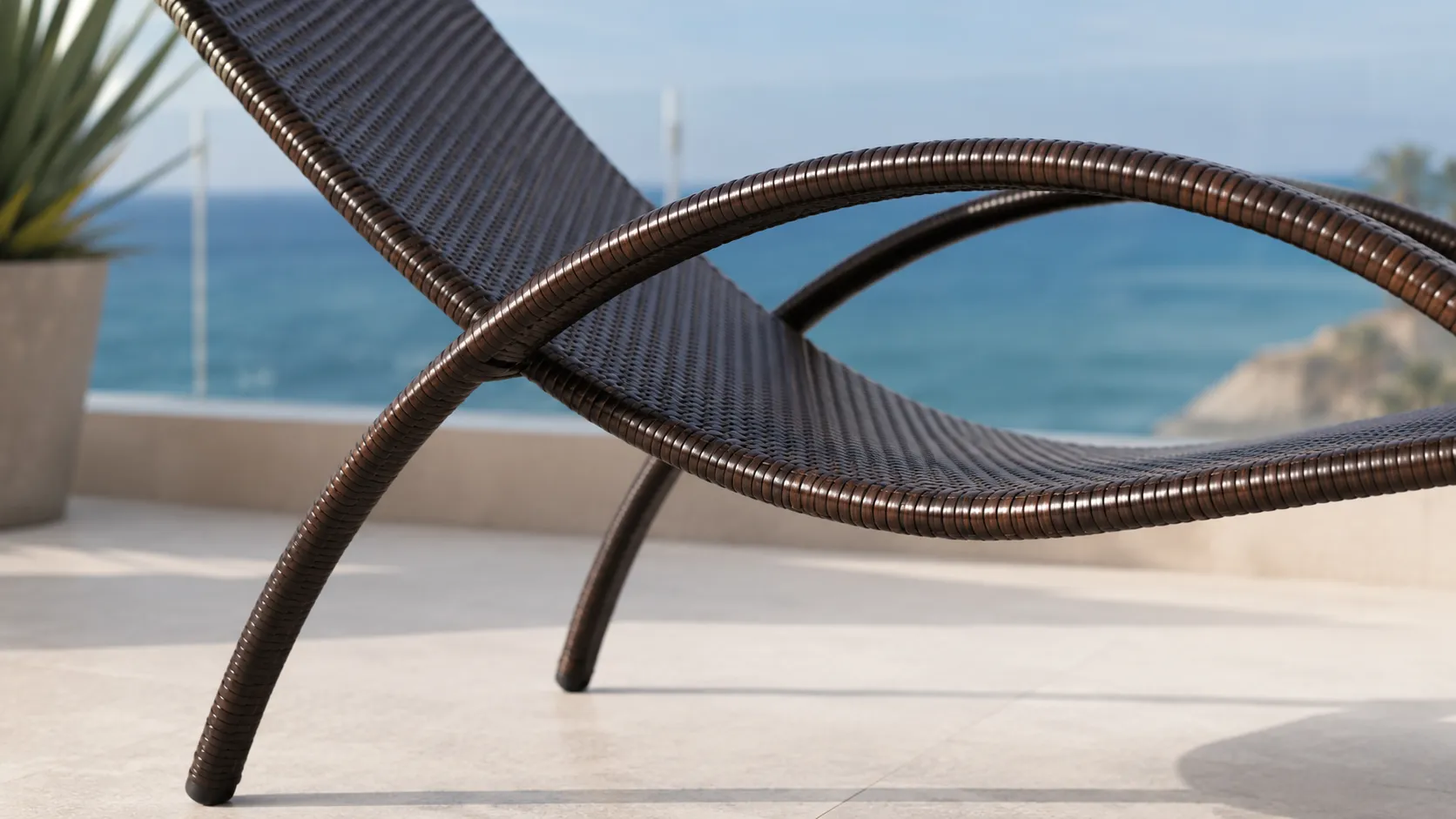 Stainless steel support frame detail of PE rattan outdoor sun lounger