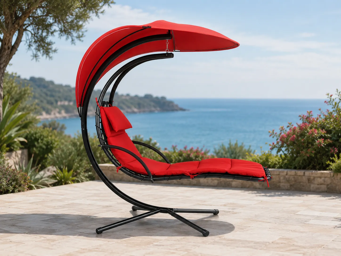 Side view of stainless steel outdoor hanging lounge chair with red canopy