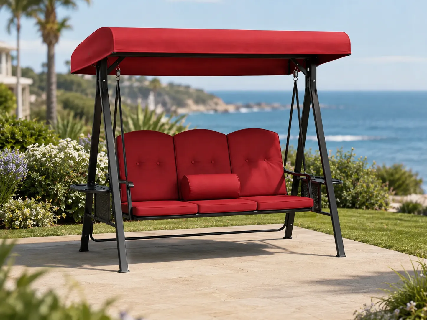 Side view of steel outdoor canopy swing sofa with red cushions