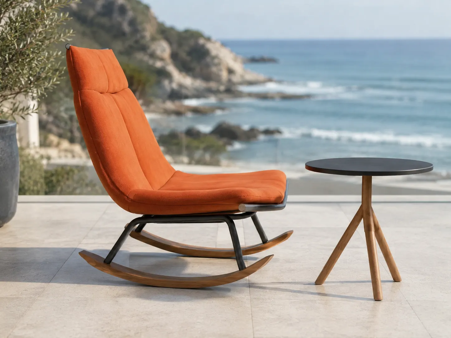 Side view of teak outdoor rocking lounge chair with curved wooden base