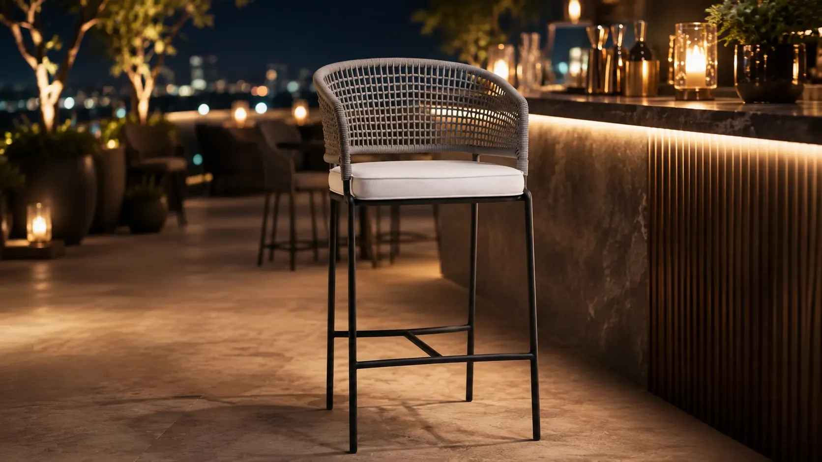 White cushioned seat detail of grey rope outdoor bar stool
