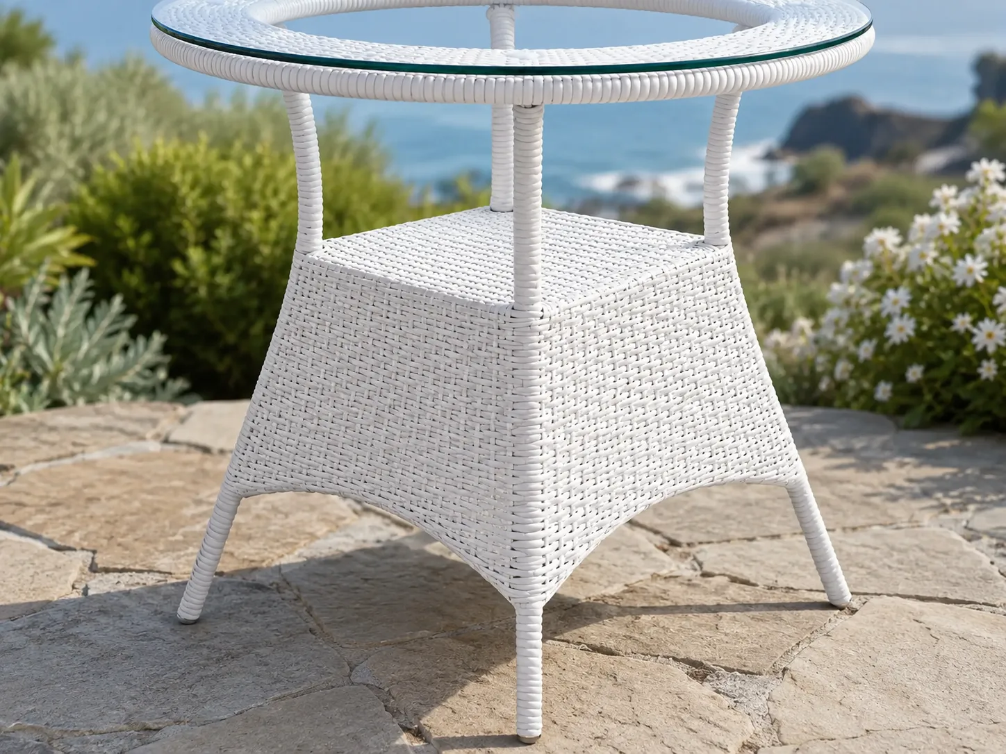 Base structure detail of white wicker round glass table
