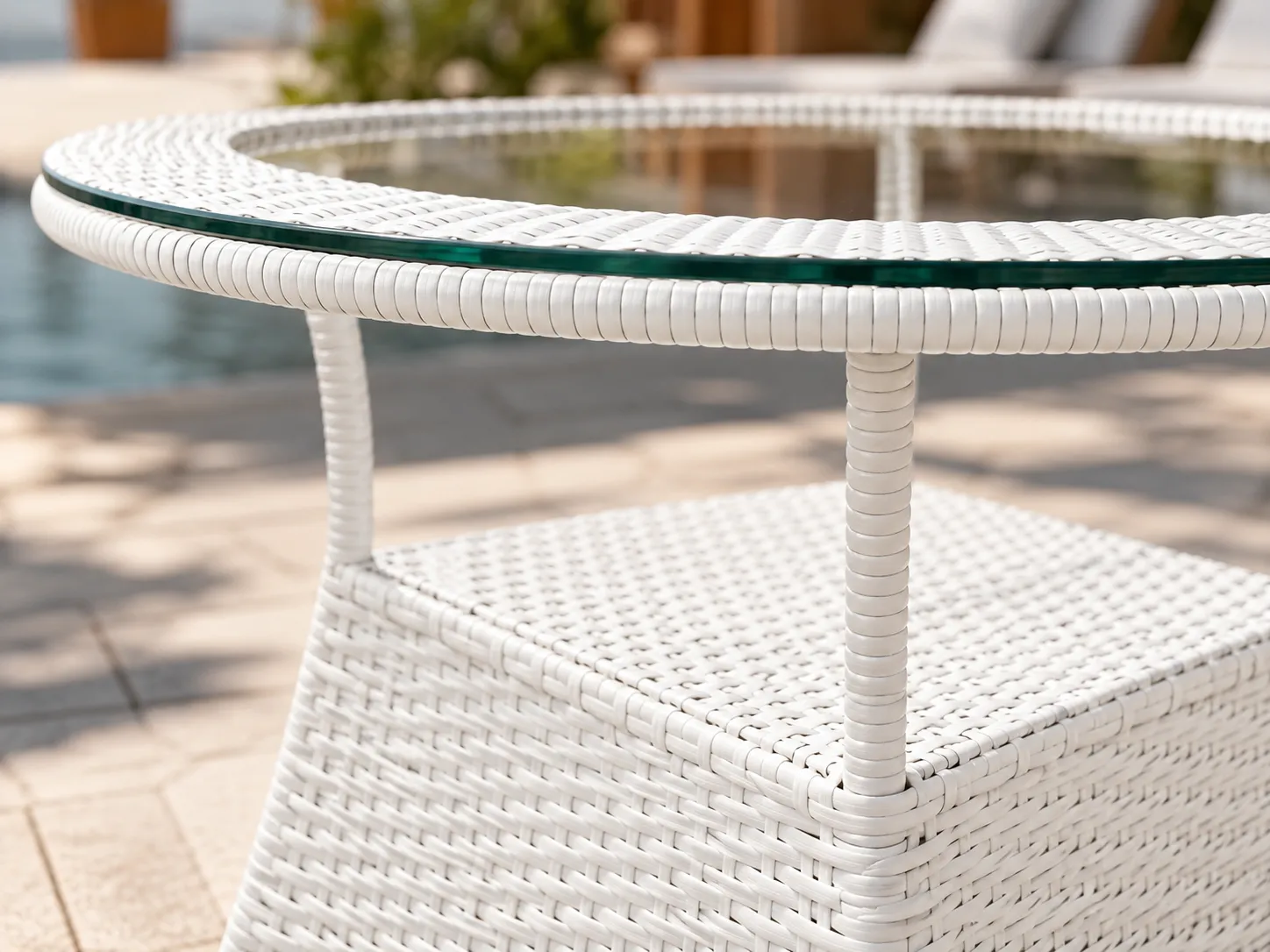 Close-up detail of white woven wicker frame for outdoor round table