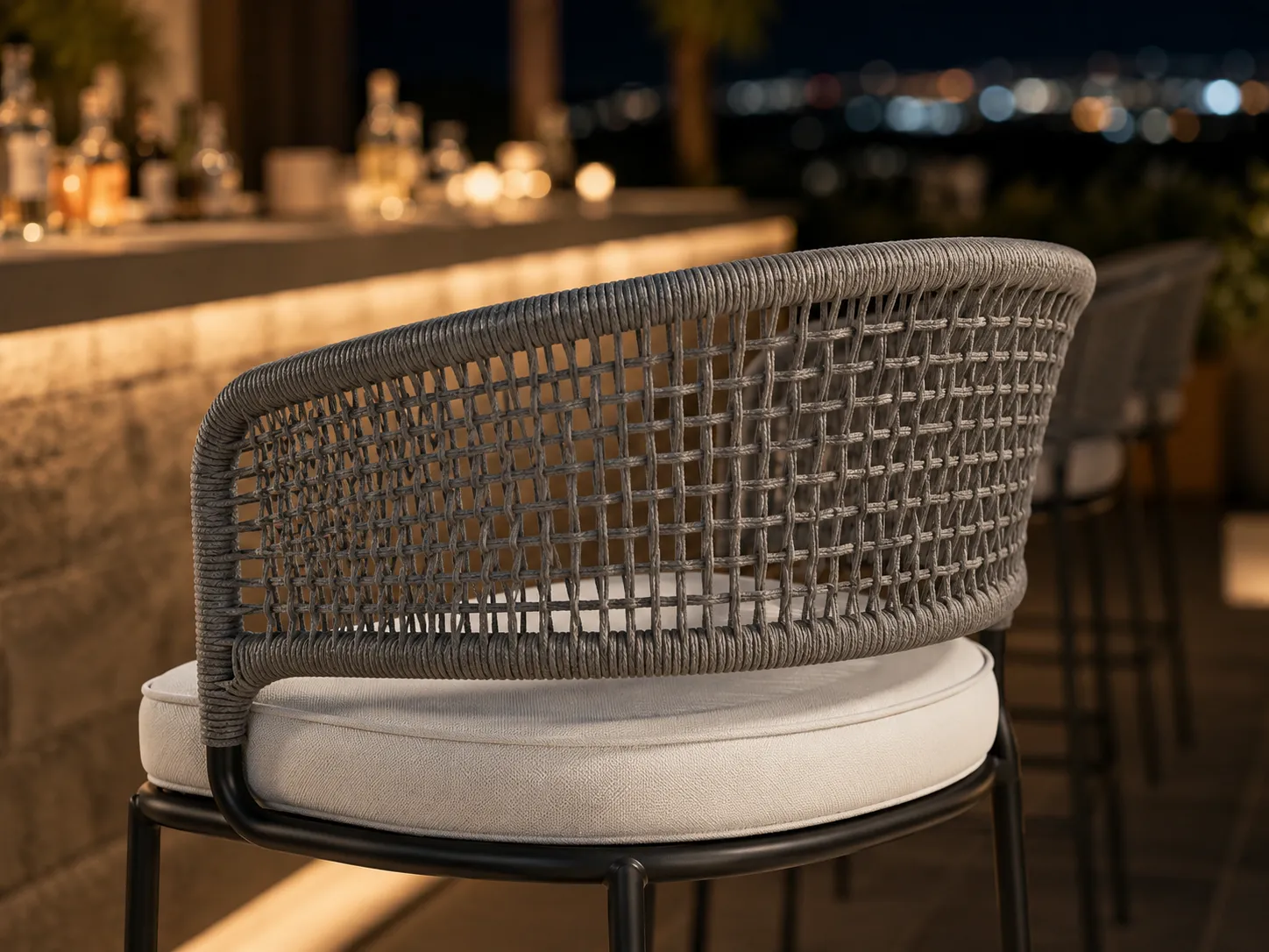 Woven grey rope backrest detail of outdoor bar stool for commercial use