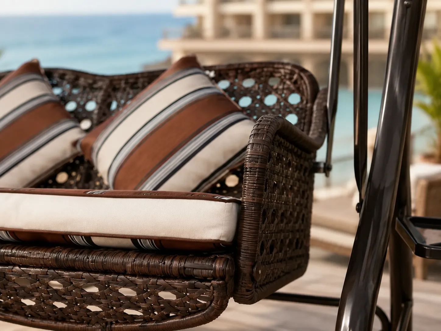Close-up detail of PE rattan woven swing sofa seat